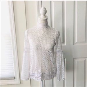 White crochet high neck bell sleeve blouse